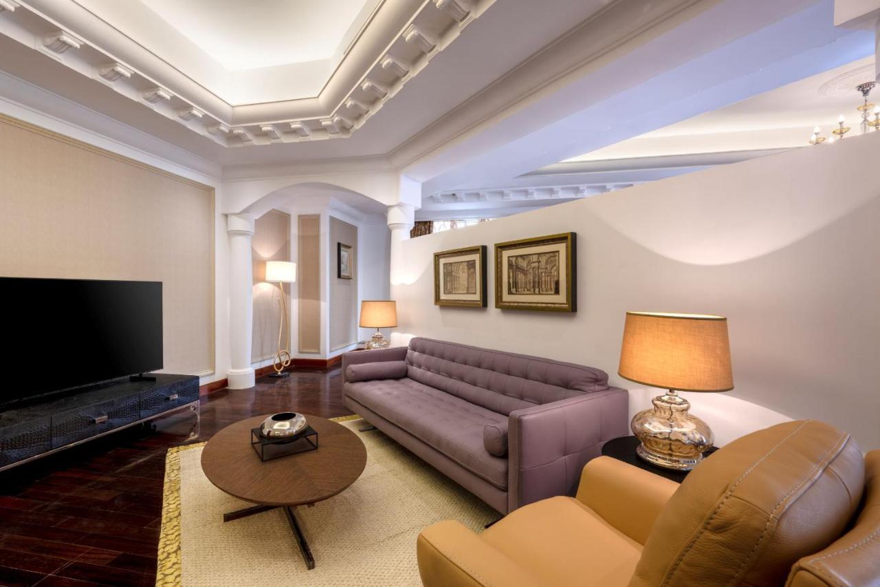 Dusit Hotel & Suites - Доха Екстериор снимка A living room