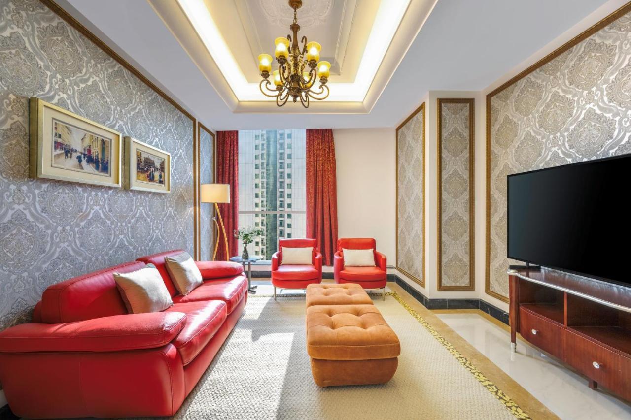 Dusit Hotel & Suites - Доха Екстериор снимка A living room in a hotel